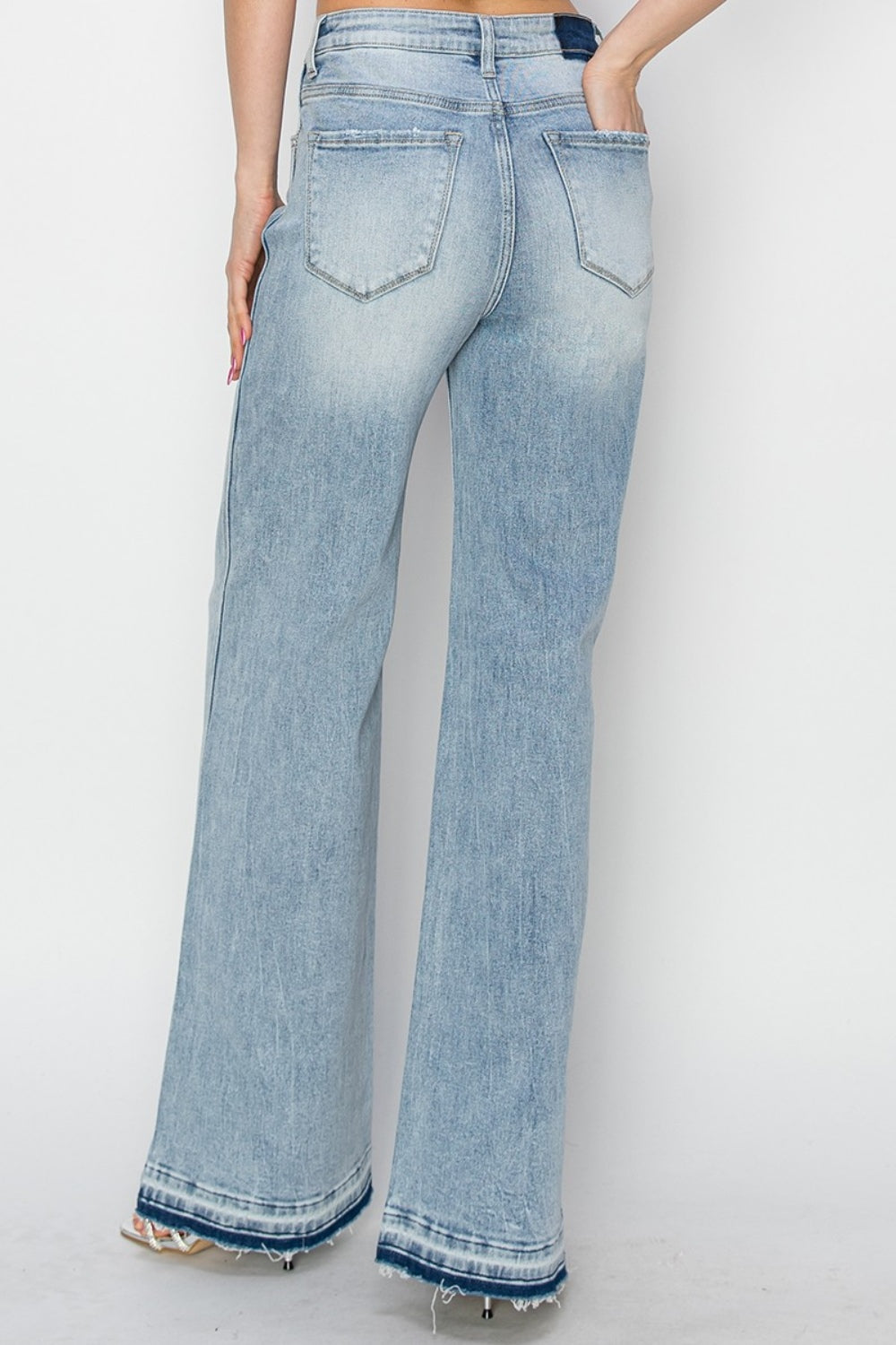 Risen High Rise Shadow Hem Wide Leg Jeans