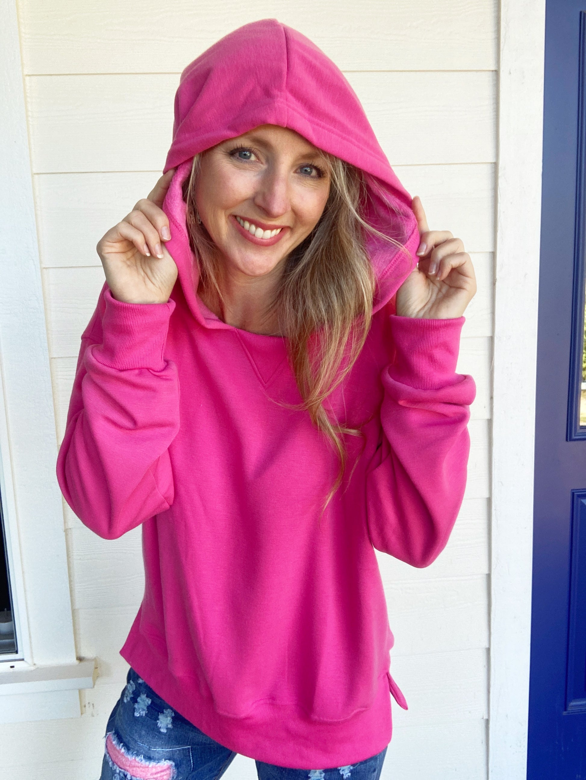 Incredibly soft, incredibly stretchy, and 9 color options?!  Stock up on this one!  This relaxed fit sweatshirt is lined with a silky fleecy lining all throughout.  Not too thick, not too thin...this side slit hoodie is just right!