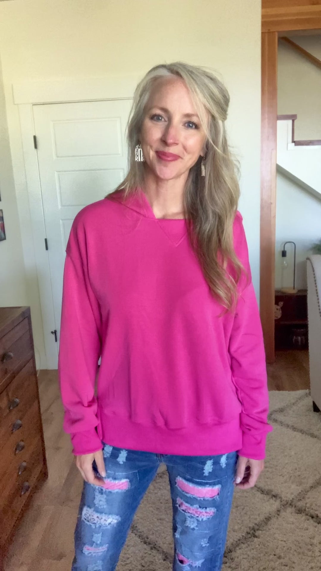 Incredibly soft, incredibly stretchy, and 9 color options?!  Stock up on this one!  This relaxed fit sweatshirt is lined with a silky fleecy lining all throughout.  Not too thick, not too thin...this side slit hoodie is just right!